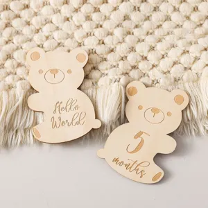 Wooden baby milestone wooden bear prop details for monthly growth photography setup.
