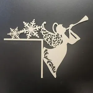 Detailed close-up view of the Christmas wooden angel and snowflake door corner sign.