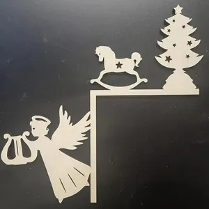 Wooden Christmas door corner decor detail showing angel, rocking horse and tree design for home.