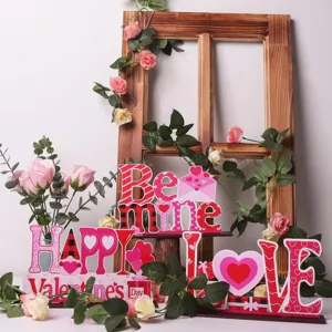 Valentine wooden tiered tray sign detail with romantic heart and love letters decor.