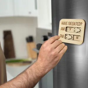 Wooden pet feeding reminder magnet detail, interactive AM PM slider design for kitchen use.