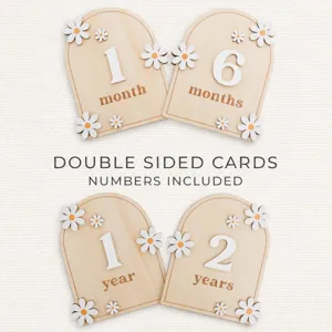 Wooden baby milestone photo props with daisy cards and numbers for newborn photography.