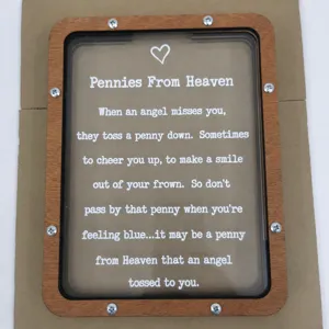 Wooden piggy bank with acrylic front and inspiring English poem design for home decor.