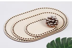 Detail view of laser cut wooden crochet basket bases with pre-punched holes for DIY crafts.