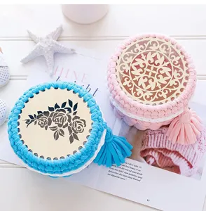 Handmade crochet storage basket with laser cut wooden lid and tassel for DIY crafts decor