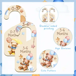 Wooden baby nursery closet dividers set for newborn clothes and monthly size organization.