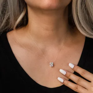 Elegant invisible fishing line necklace with sparkling radiant cut cubic zirconia pendant.