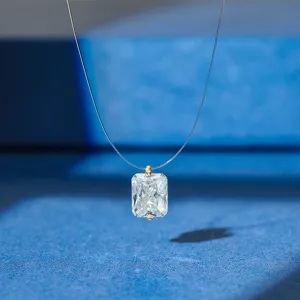 Square cut clear cubic zirconia pendant on an invisible fishing line choker necklace