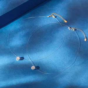 Close-up of S925 silver invisible fish line necklace with sparkling cubic zirconia pendant
