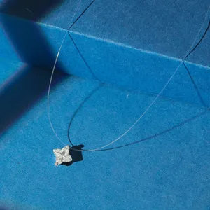 Close-up of S925 silver choker necklace with sparkling star-shaped zircon pendant