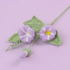 Detailed macro view showing the texture of handmade crochet purple morning glory yarn flower