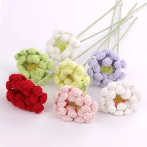 Detailed arrangement of colorful handmade crochet gerbera daisy flowers for home decor