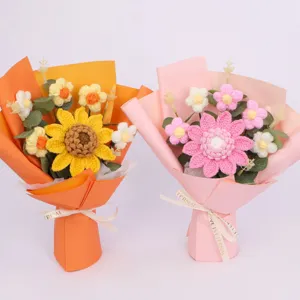 Handmade knitted sunflower and pink daisy bouquets with Love is Eternal ribbon details