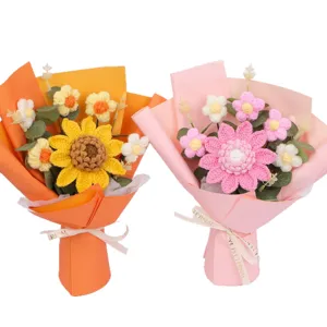 Handmade crochet sunflower and pink daisy bouquets wrapped in colorful gift paper
