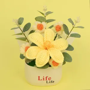 Detailed macro view of handmade crochet yellow flower bouquet in white Life pot