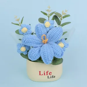 Handmade crochet blue puff flowers in a pot for desktop decoration and Mother's Day gift