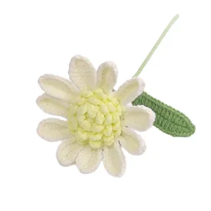 Hand-crocheted white daisy flower with yellow center and green leaf for home decoration