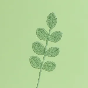 Vista macro dettagliata di uno stelo di foglia all'uncinetto verde per i bouquet
