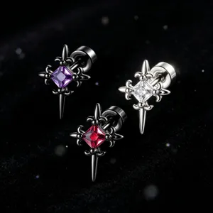 Detail shot of vintage punk style cross stud earrings with colorful cubic zirconia inlay