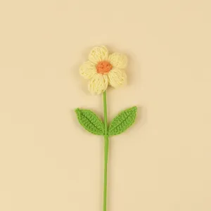 Hand-crocheted yellow puff flower with green leaves for home office decor gift