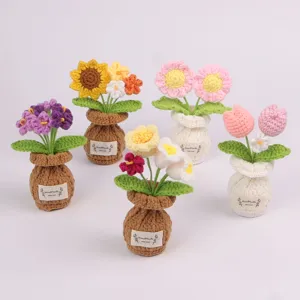 Handmade crochet flower pots collection with diverse floral designs and warm labels