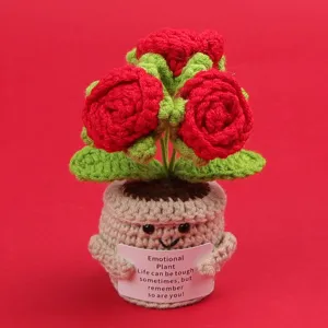 Cute handmade crochet emotional plant featuring red roses and a motivational card