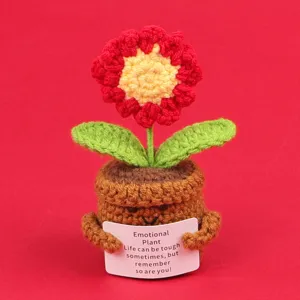 Detail of a handmade crochet flower pot with a motivational card for emotional support