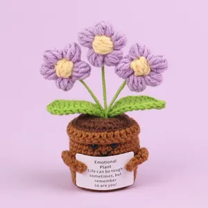 Detailed view of a handmade crochet emotional potted plant holding a motivational quote card