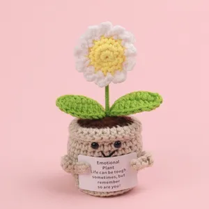 Detail of handmade crochet emotional plant holding an inspirational quote card