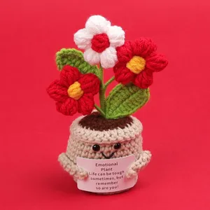 Handmade crochet emotional potted plant holding a card with inspirational message