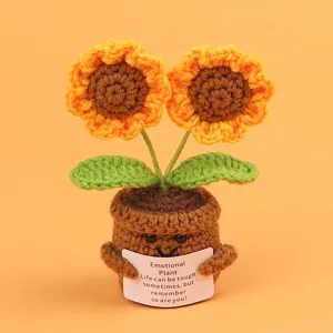 Detailed view of handmade crochet sunflower pot with encouraging emotional plant card.