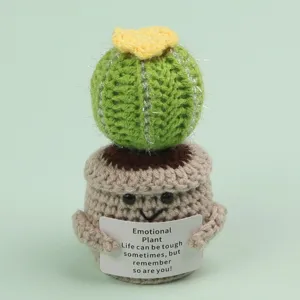 Detailed view of handmade crochet cactus with motivational emotional plant card