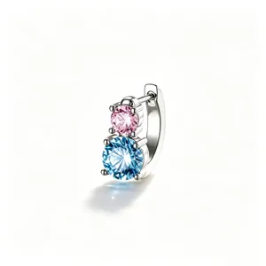 Close-up of titanium steel hoop earring with stacked pink and blue round-cut crystals