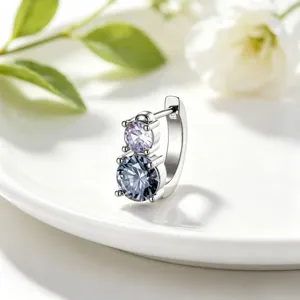 Close-up detail of 316L titanium steel ear hoop with stacked purple and blue gemstones.