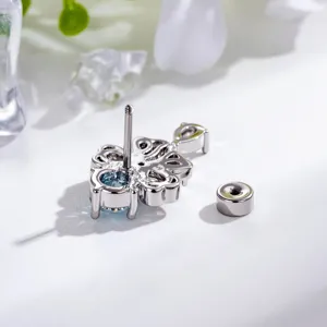 Eleganter silberfarbener Schleifen-Ohrring mit blauem Edelstein und Schraubverschluss