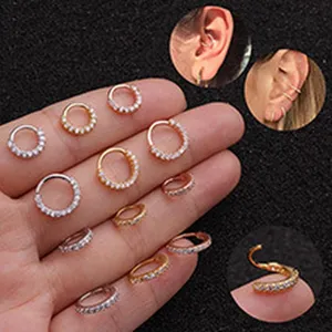 Detailed display of various stainless steel hoop earrings with sparkly cubic zirconia