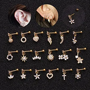 Detail of various stainless steel cartilage stud earrings with micro-inlaid zircon charms.