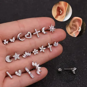 Stainless steel piercing earrings set with cubic zirconia in moon star heart shapes