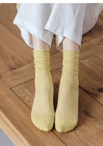 Breathable thin women crew socks with roll top design in light yellow color for spring season