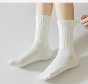 Comfortable solid white ribbed mid-calf socks for women, spring cotton elastic stretch hosiery.