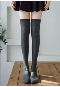 Dark grey ribbed over-the-knee high socks, soft cotton thigh-high slim leg hosiery detail shot.