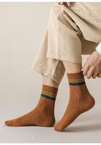 Men's mid-tube combed cotton socks, ribbed knit design with colorful stripes, comfortable detail view.