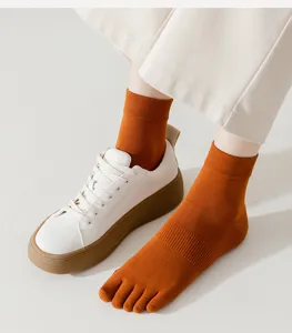 Comfortable cotton five-finger socks for women, solid color mid-tube split toe design daily wear.