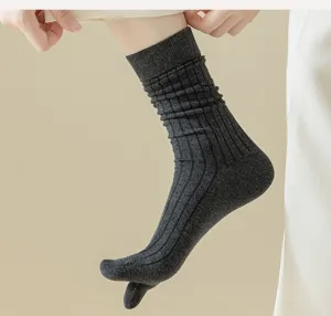 Detail view of grey cotton split toe socks featuring ribbed texture and comfortable fit.