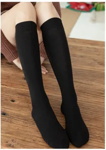 Plus size black knee high long socks for women, comfortable thick winter cotton stockings.