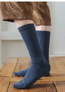 Women solid color ribbed mid-calf cotton socks, comfortable autumn winter daily wear detail.