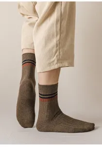 Men's brown ribbed mid-tube cotton socks with classic stripes, comfortable detail view.