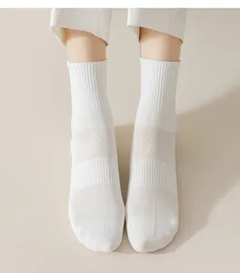 White mesh mid-tube socks detail view, breathable cotton spring and summer everyday wear.
