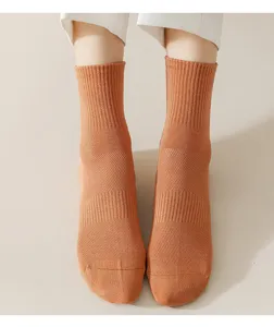 Comfortable breathable cotton mid-tube women socks with mesh design for spring and summer daily wear.