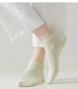 Close-up view of avocado green cotton ankle socks, showing soft and breathable fabric.